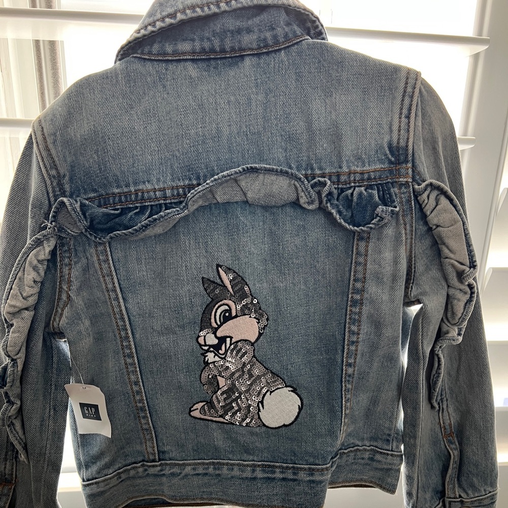 Disney by Gap. Sequince Thumper Ruffle sleeve jean Jacket..NWT. Snap button